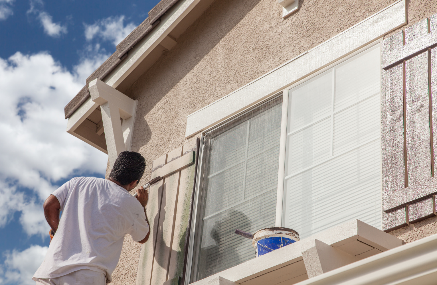 Exterior painting detail — brush work on trim
