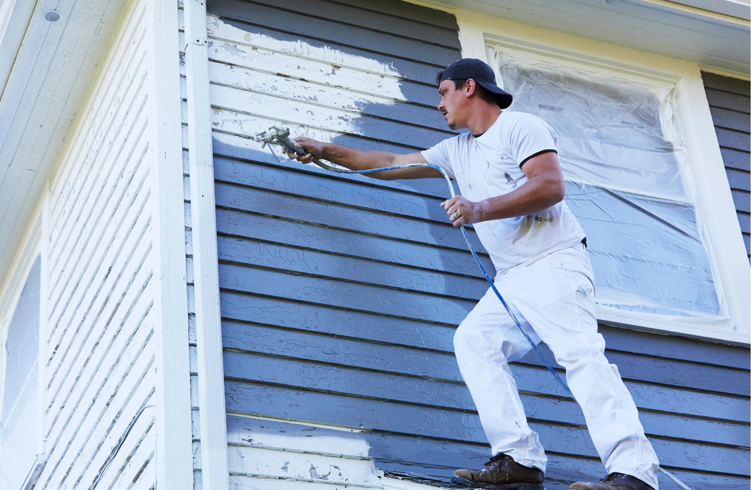 Exterior spray painting — siding